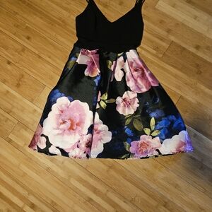 Black top flowery skirt dress